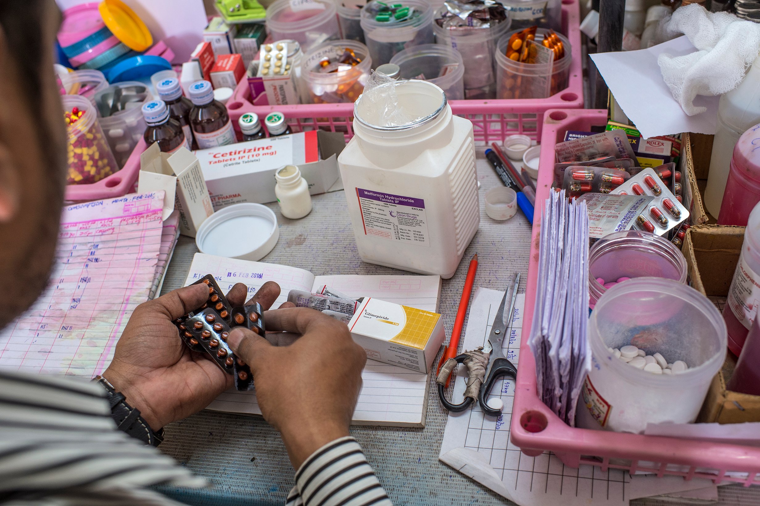 diabetes_medicines_india man manipulating medicines
