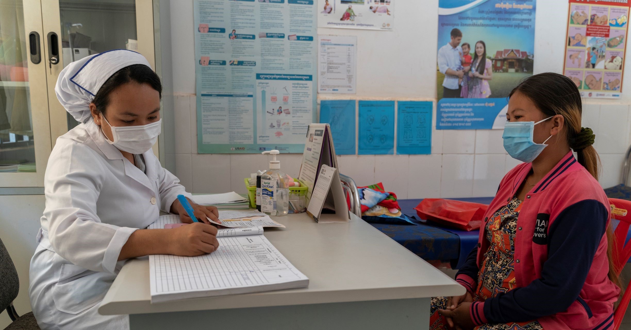 health_care_worker_antenatal_check_cambodia A health-carte worker conducts an antenatal check-up in a health-care centre in Cambodia